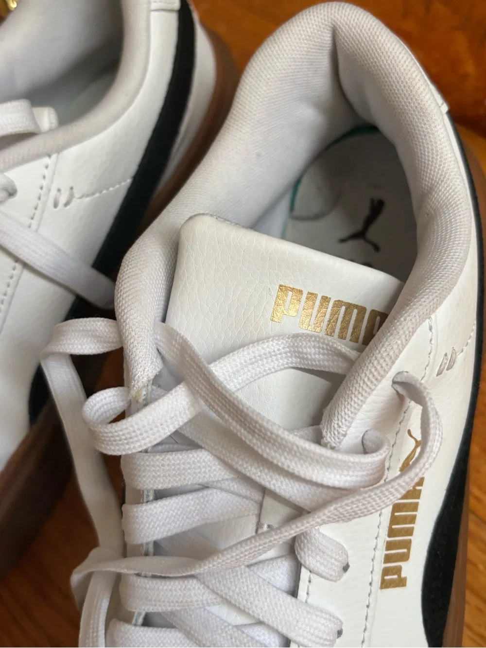 Puma White Sneakers with Black Stripe and Gum Sole